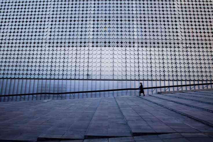 man standing on modern office building